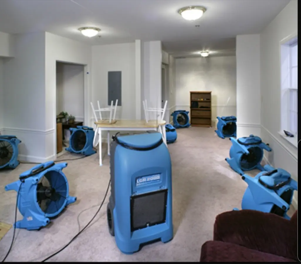 Air movers and dehumidifier setup for Water Damage Restoration in Augusta